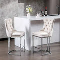 Tabourets de bar Okak (lot de 2), revêtement moderne en velours avec capitonnage et garniture cloutée, piètement en métal nickel brossé pour îlot de cuisine