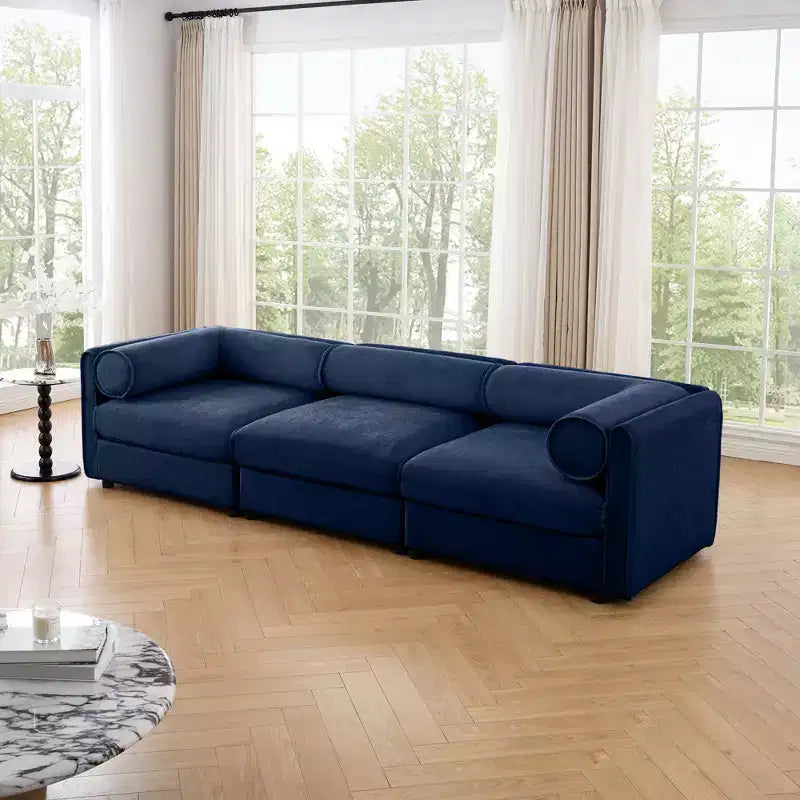 Élégant canapé blanc en chenille avec assise de rangement, dossier et accoudoirs cylindriques