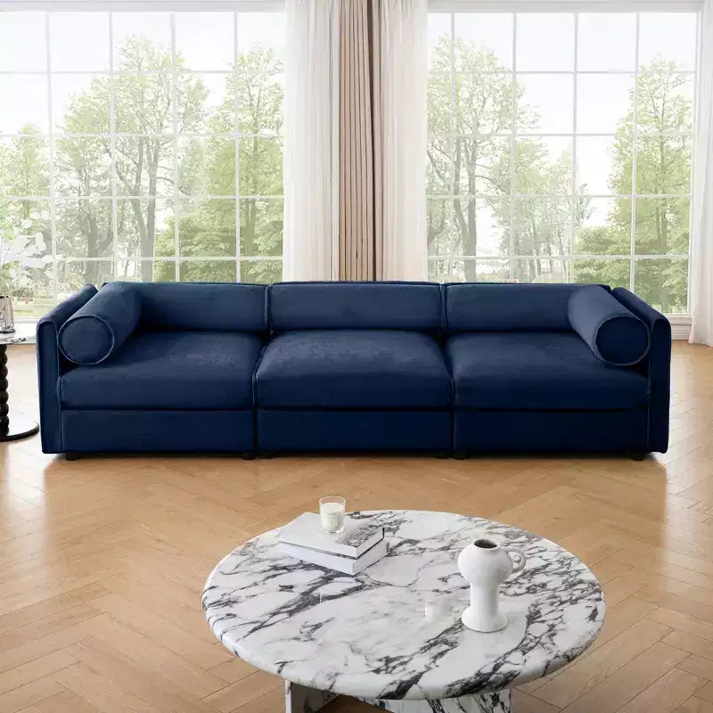 Élégant canapé blanc en chenille avec assise de rangement, dossier et accoudoirs cylindriques
