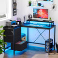 43 Inch Computer Desk, L Shaped Desk with Power Outlets and Led Lights, 3-Drawer Gaming Desk with Storage Shelves and Monitor Stand