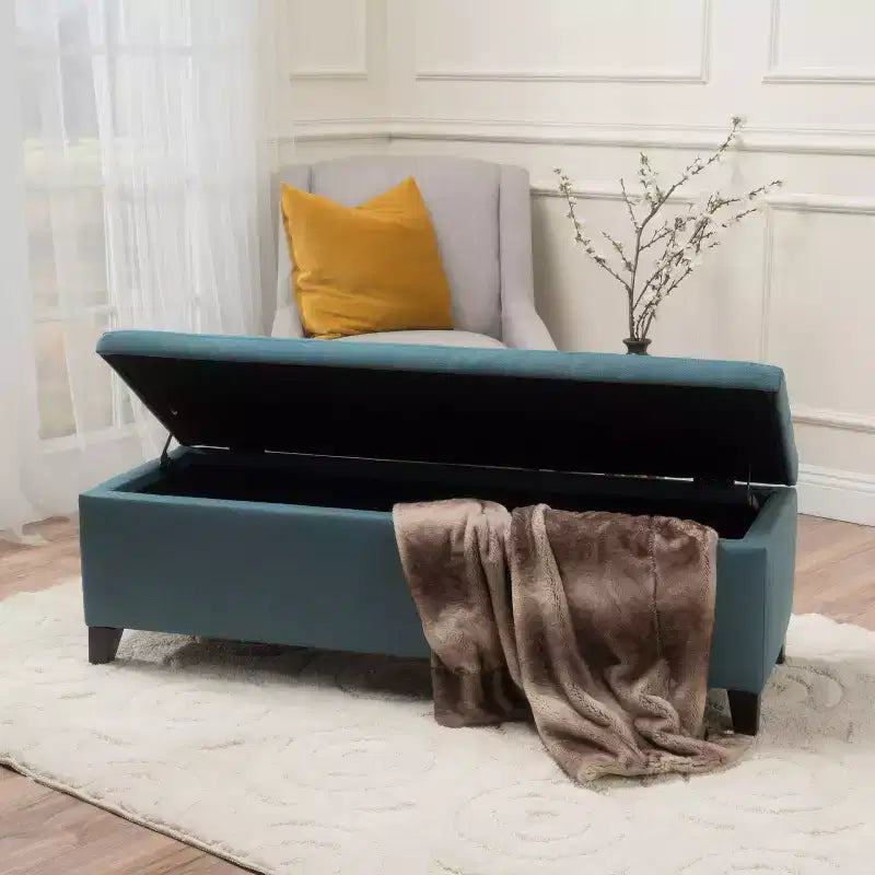 Pouf de rangement contemporain Carducci en tissu GDFStudio avec pieds en bouleau