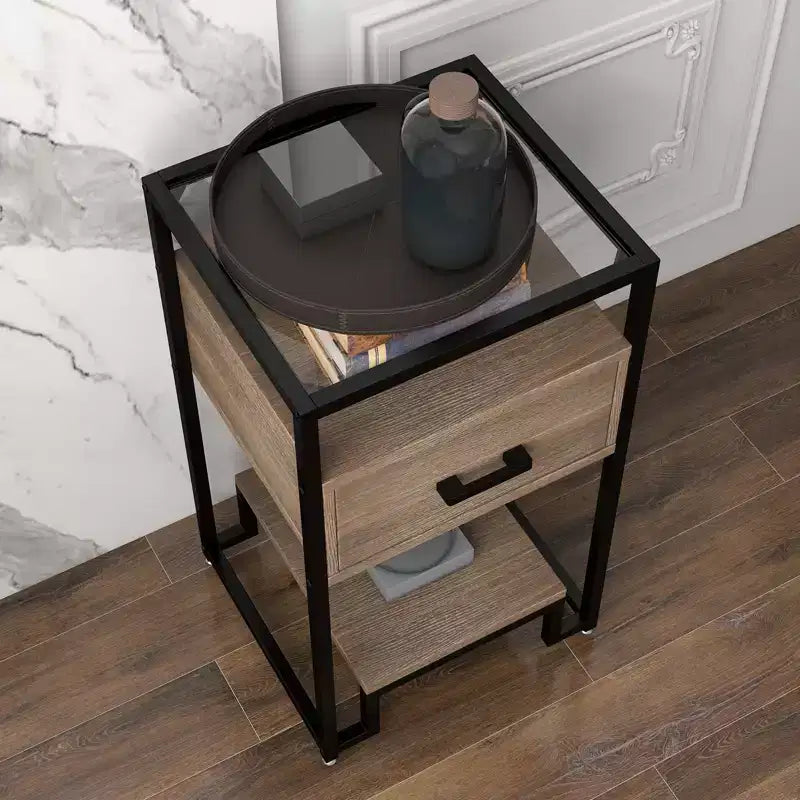 Table de chevet avec plateau en verre trempé, tiroir en bois et pieds réglables