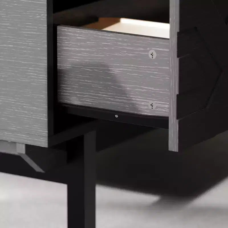 Table basse noire et dorée avec 4 tiroirs