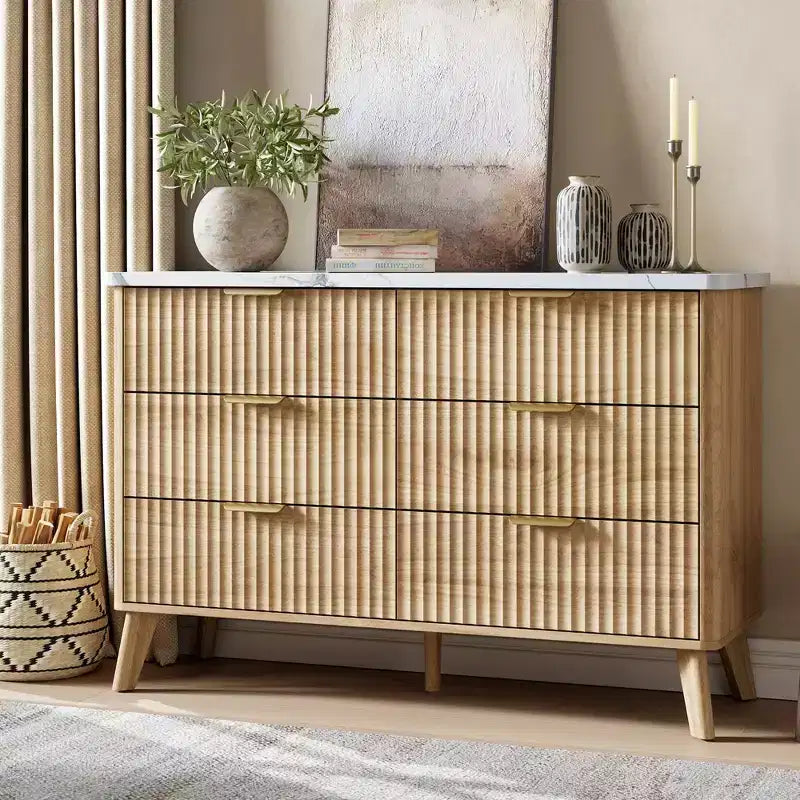 Commode à 6 tiroirs, 120 cm de large, avec tiroirs en bois cannelé et poignées dorées, design profilé incurvé pour chambre et salon